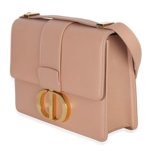 Item #: 152717 Features Interior: One zip pocket Dimensions: 9.25 x 6.5 x 2 in Handbag Closure Type: Push Lock Strap...