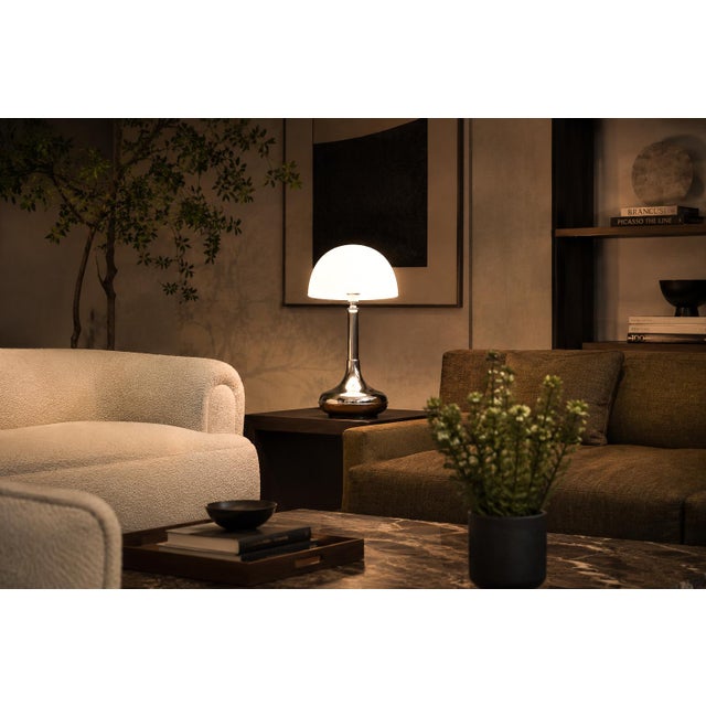 A striking study in proportion, reflection, and atmospheric light, this Brazilian Modern table lamp from the 1960s...