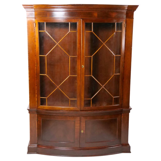 Add a touch of historical charm to your space with this North American Early 20th Century Mahogany Wood Demilune Shape...