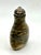 The snuff bottle with the unusual shape is made of Jasper, also called Picasso Jasper or Spider web Jasper because of the...