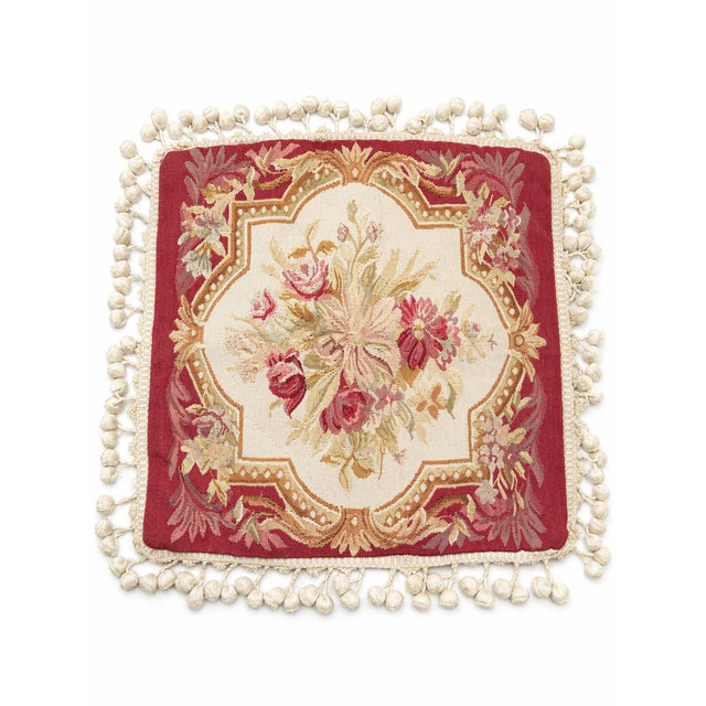 A beautifully textured vintage pillow cover featuring a hand-tufted, high-pile textile front and charming pom-pom fringe...