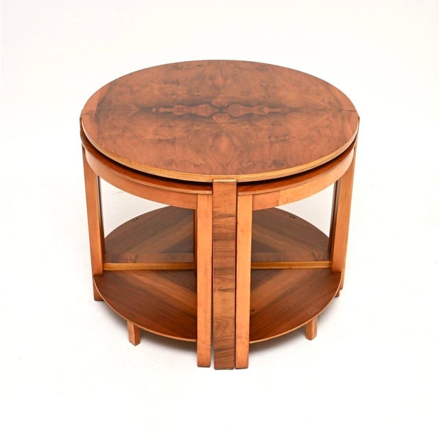 A stylish and extremely well made Art Deco nesting coffee table in figured walnut. This was made in England, it dates from...