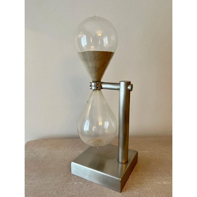 Modern industrial brushed aluminum hourglass - in the style of Bauhaus industrial - German, Berlin. An interesting...
