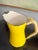 Dansk metal enamel pitcher with lanyard woven handle. Designed by Jens Quistgaard and made in Denmark. Marked with stamp...