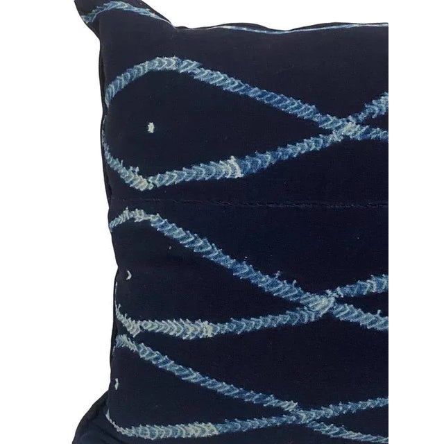 Usually the textile is woven by men and dyed by women. The indigo colour is obtained from plant sources (indigofera plant...