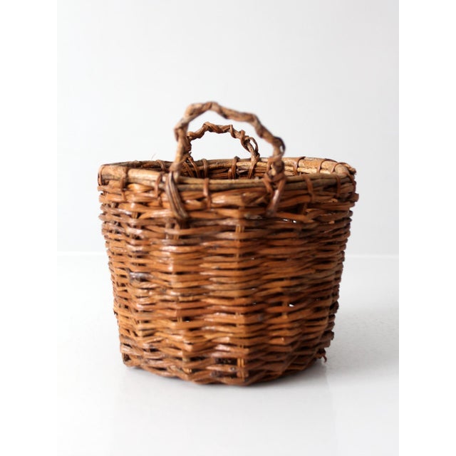 Vintage Handwoven Wicker Basket With Twisted Handles For Sale - Image 9 of 11