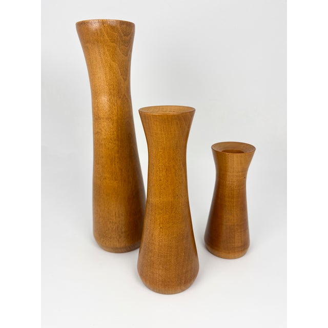 Vintage MCM style set of 3 turned wood tapered candle holders. A really beautiful set. In great vintage condition, with...