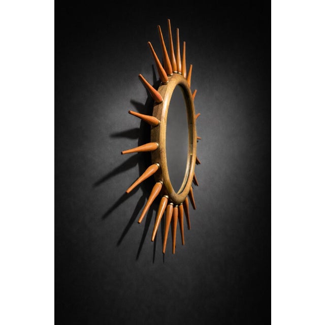Late 20th Century Mid-Century Modern Style Wood Sunburst Wall Mirror With Orange Spindle Rays (24.5” Diameter) For Sale - Image 5 of 6
