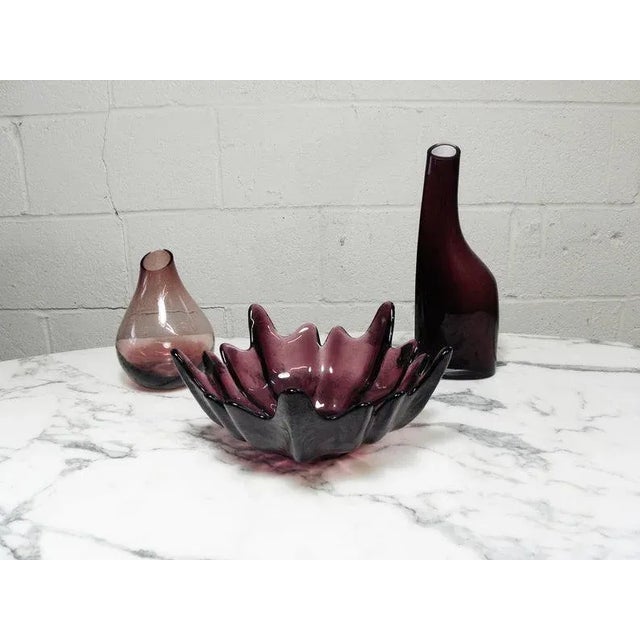 Group of 3 beautiful vintage purple art glass. A beautifully curated original art glass group. Colors are purple and clear...