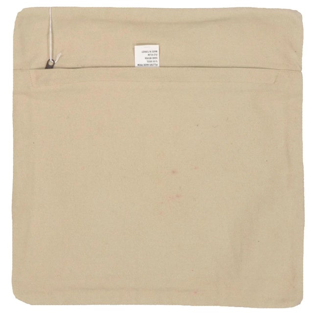 This pillow is made with a vintage handwoven Turkish hemp rug fragment. It has a cotton back and a zipper closure. Please...