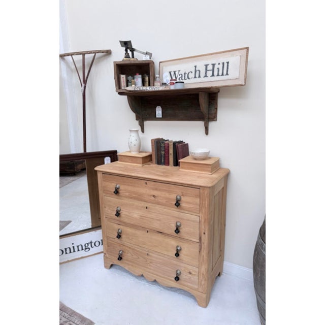 An antique scrubbed pine four‑drawer chest with two small trinket boxes resting on top, this piece brings the soft,...