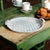 Versatile ceramic woven platter or shallow bowl in attractive basketweave pattern. Classic white lends to alltablescaped...