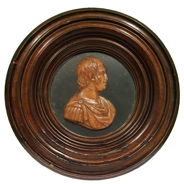 Low relief with Ferdinando IV Borbone' profile as a Roman Emperor, made by patterned wax and coated by a circular walnut...