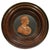 Low relief with Ferdinando IV Borbone' profile as a Roman Emperor, made by patterned wax and coated by a circular walnut...