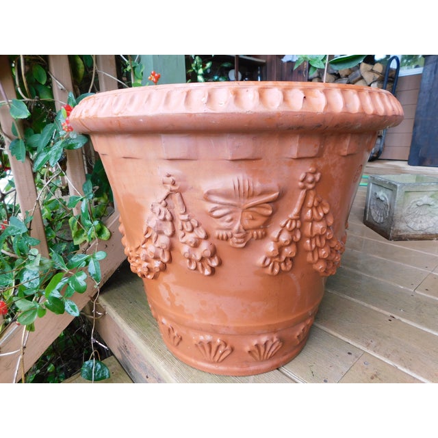 Mid-century Italian terracotta planter by Bitossi F.&F., distinguished by richly molded classical relief and substantial...