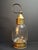 An exceptional and unusually heavy antebellum American brass fixed-globe hand/marine lantern, dating to circa 1840–1855....