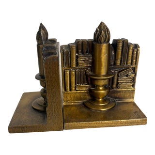 Vintage Brass Bookends Depicting a City Scape and Torch - A Pair For Sale