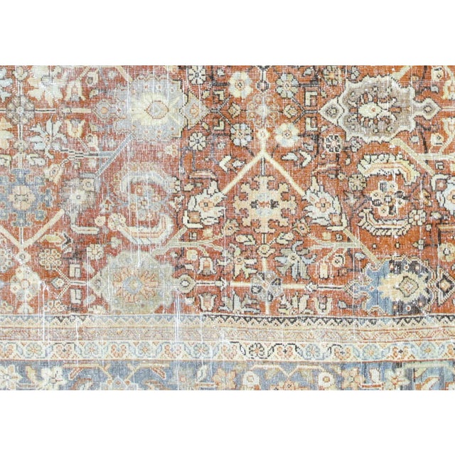 This Vintage Persian Mahal Rug was hand woven in Iran's Mahal region and has been expertly distressed and refinished in...