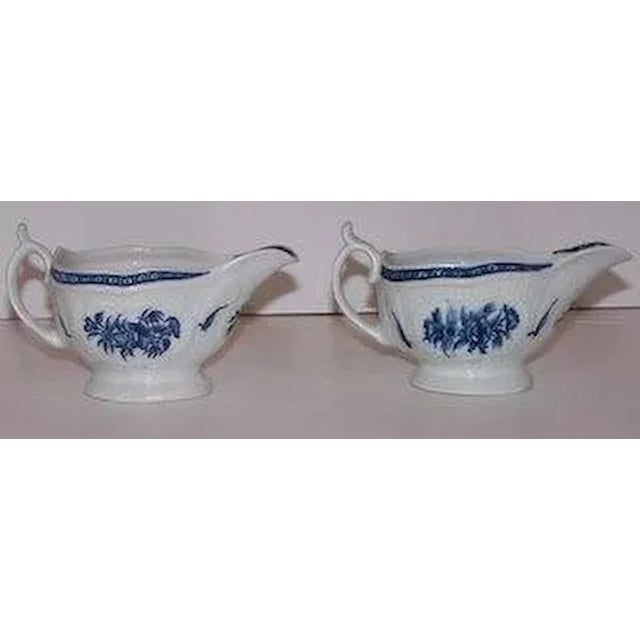 Pair of rare Georgian Worcester blue and white sauce boats. c1785 some professional repairs. Measure 7" by 4" by 3".