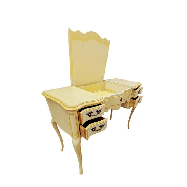 Vintage French Provincial Vanity Desk This is a charming vintage French Provincial-style vanity desk featuring a soft...