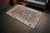 Handwoven in Turkey, this vintage kilim rug brings a touch of Anatolian craftsmanship to your home. Crafted with wool and...