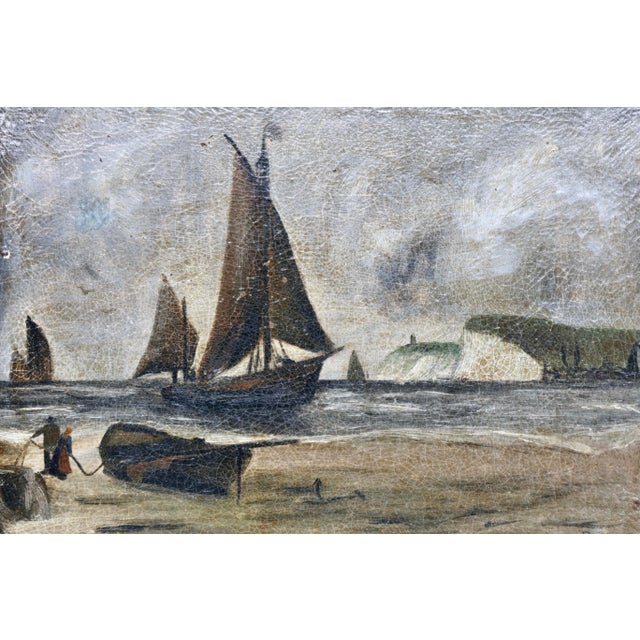 A moody and atmospheric maritime scene depicting fishing vessels on open water, with dramatic storm clouds and a rocky...