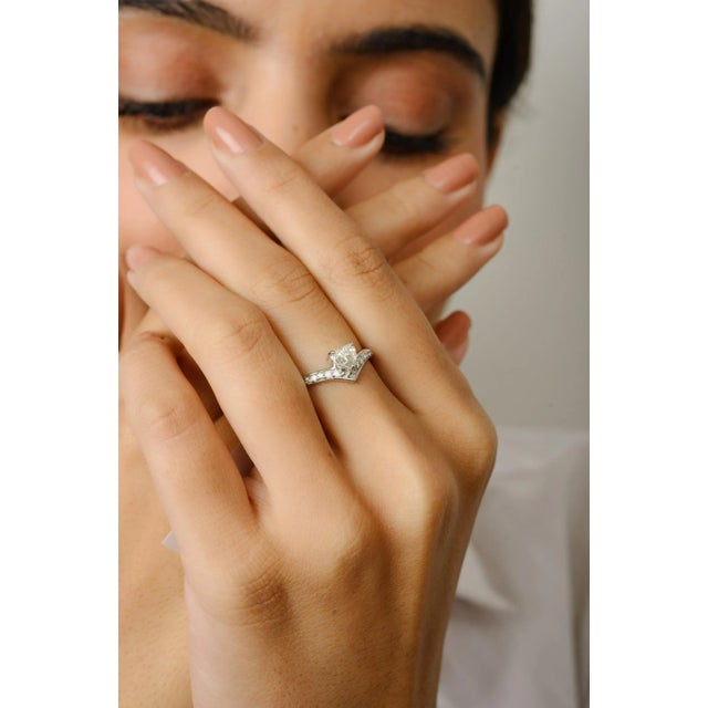 This is part of Chairish’s Fine Jewelry assortment. Brilliant Diamond Heart Chevron Engagement Ring in 18K Gold featuring...