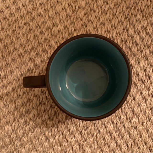 Dark brown mixed with a lovely blue glaze. Made in the 1970’s. In great vintage condition. See photos. Plate is 10 inches...