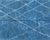 Ocean depths meet timeless pattern. This hand-knotted Moroccan wool rug immerses a space in vibrant cerulean blue,...