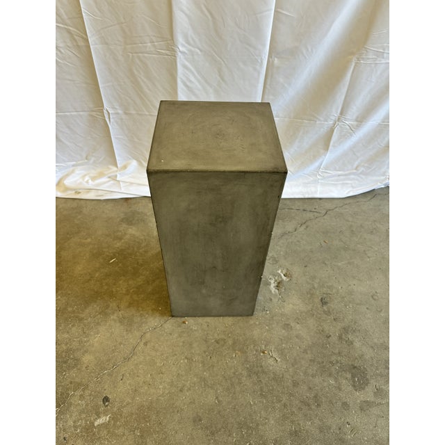 Pedestal cast in natural concrete with a heavy duty fiberglass core. Perfect for highlighting a sculpture, vase, potted...