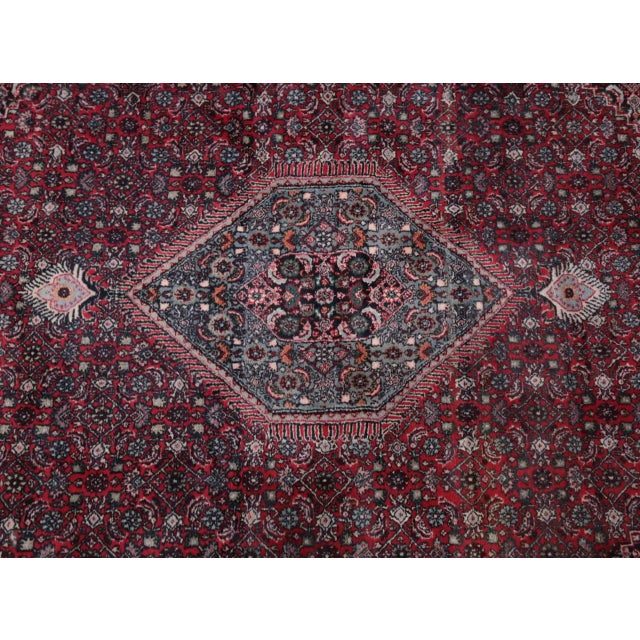 The rug was made in India - Indobidjar. The warp and weft of the rug are made of cotton, the pile is made of high-quality...