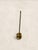 A charming antique brass rum or spirit ladle featuring a deep bulbous bowl and an exceptionally long wire handle with a...