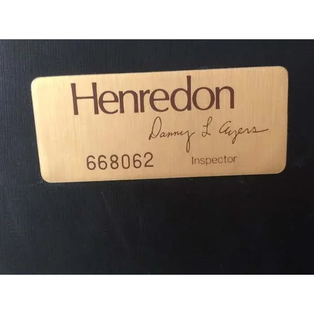 This matching pair of white lacquer nightstands features drop-down front drawers, which also provide storage when closed....