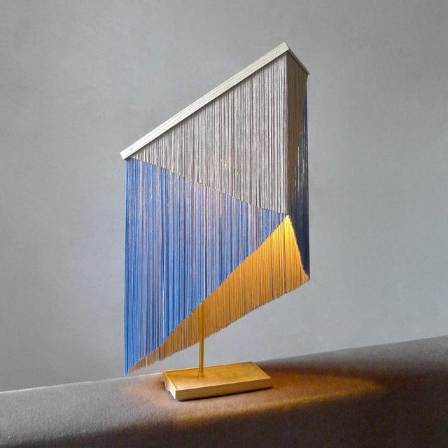 No. 30 table lamp by sander bottinga. Object size 2 dimensions: h 57-71 x w 41 x d 17 cm materials: brass, wood, leather,...