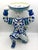 13" Tall hand painted blue and white Chinese figurine of imperial palace man with long braid and sword holding plate....