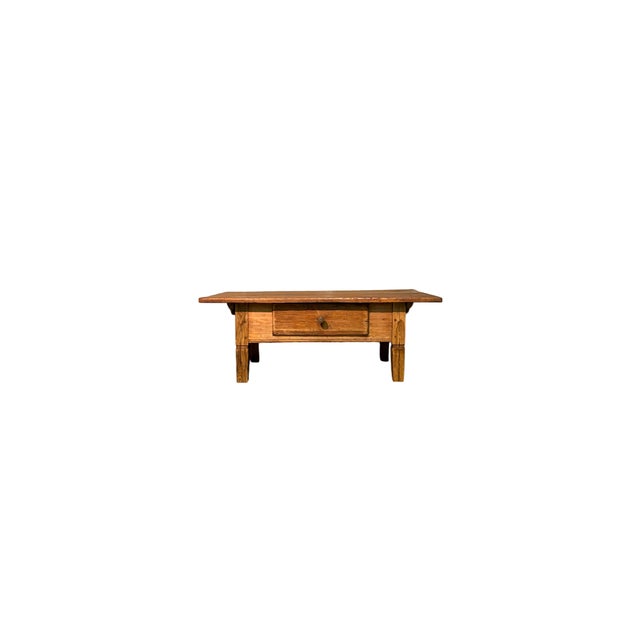 Low table in fir wood from the 1800s with a drawer on the front.
