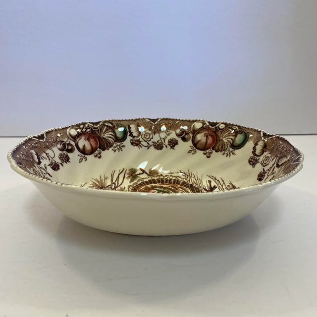 A classic piece for the Thanksgiving table, this vintage Johnson Brothers vegetable serving bowl features the beloved His...