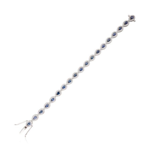 Pear Cut Blue Sapphire & Halo Diamond Tennis Bracelet For Sale In New York - Image 6 of 11