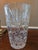Dazzling hand cut crystal vase in a richly ornamented, swirling, pin wheel like design by a virtuoso glass-maker. Crystal...