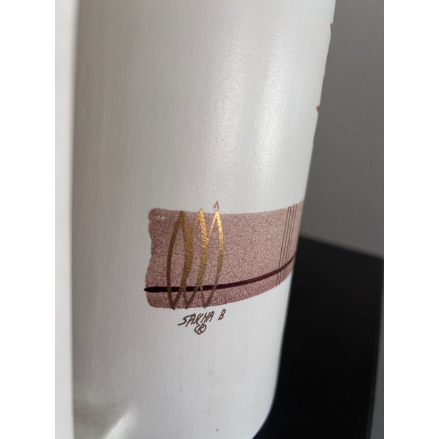 A stunning, pristine example of California Mid-Century Modern art pottery by the legendary Hollywood designer Sascha...