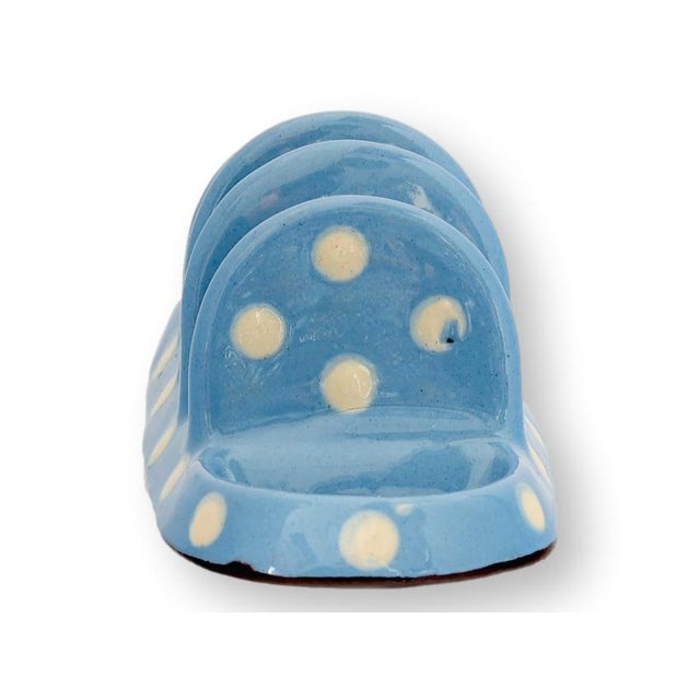 Cheerful mid twentieth century English ceramic toast rack with a blue glaze and cream polka dots. Originally designed to...
