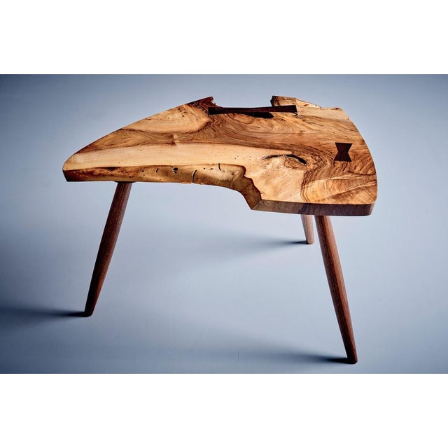 The W36 Wepman Table is a unique handcrafted piece made from English Walnut, featuring wide sapwood, a free-edge design,...
