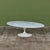 The tulip table is one of Saarinen’s most iconic designs for Knoll, c.1957. This coffee table features a cream enameled...