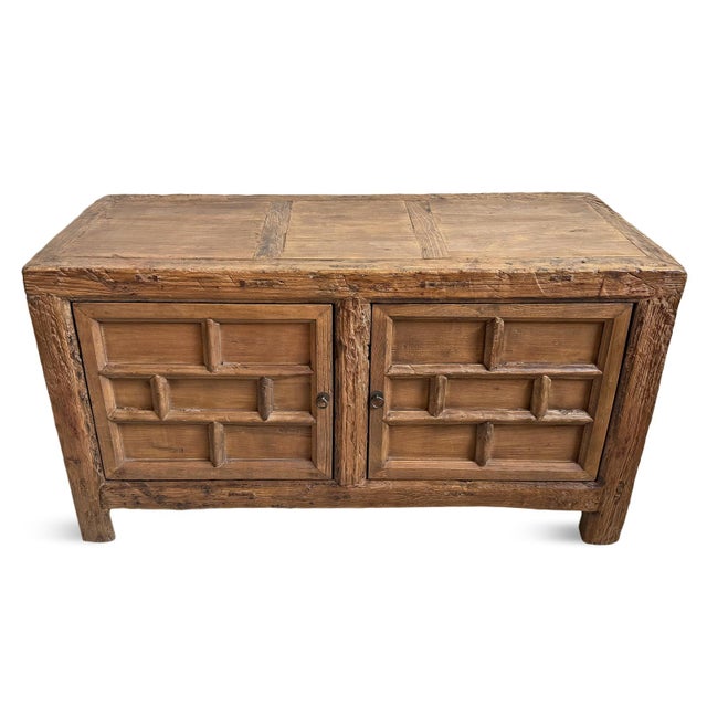 Antique Mongolian thick sturdy elm wood sideboard. Carved brick patterning on two doors and on sides. Original natural...