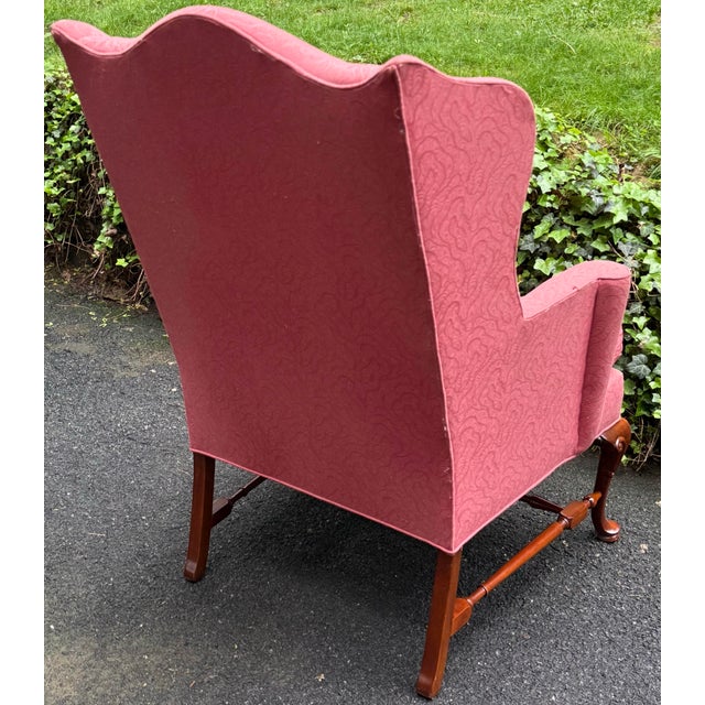 Stately chair by Hickory Furniture. Features wingback construction, loose seat cushion, tight back, Queen Anne legs and...
