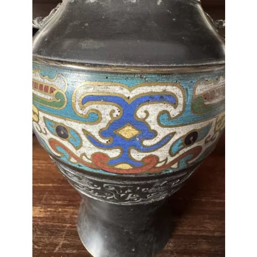 19th Century Japanese Bronze Cloisonne Vase with Handles. Marked on the bottom as shown. With aged wear and patina as...