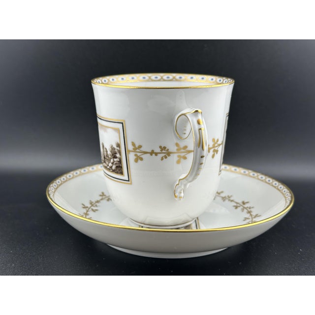 Elegant Richard Ginori porcelain mug in the classic Fiesole pattern, featuring a finely detailed Italian landscape scene...