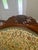 Elegant and timeless, this vintage mid-century gooseneck rocking chair features beautifully sculpted solid wood...