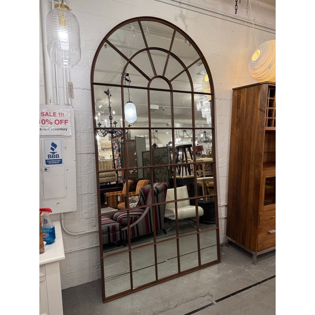 Design Plus Gallery presents the Palladian Arched Windowpane Mirror from Restoration Hardware. This large-scale mirror...