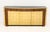 Modern Gilt Lacquered and Ebony Sideboard, with black glass inset top above three short drawers and three cabinets, each...